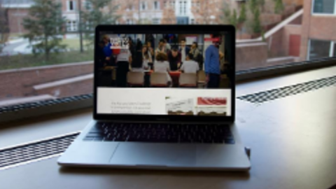 Computer featuring the Harvard Votes Challenge website