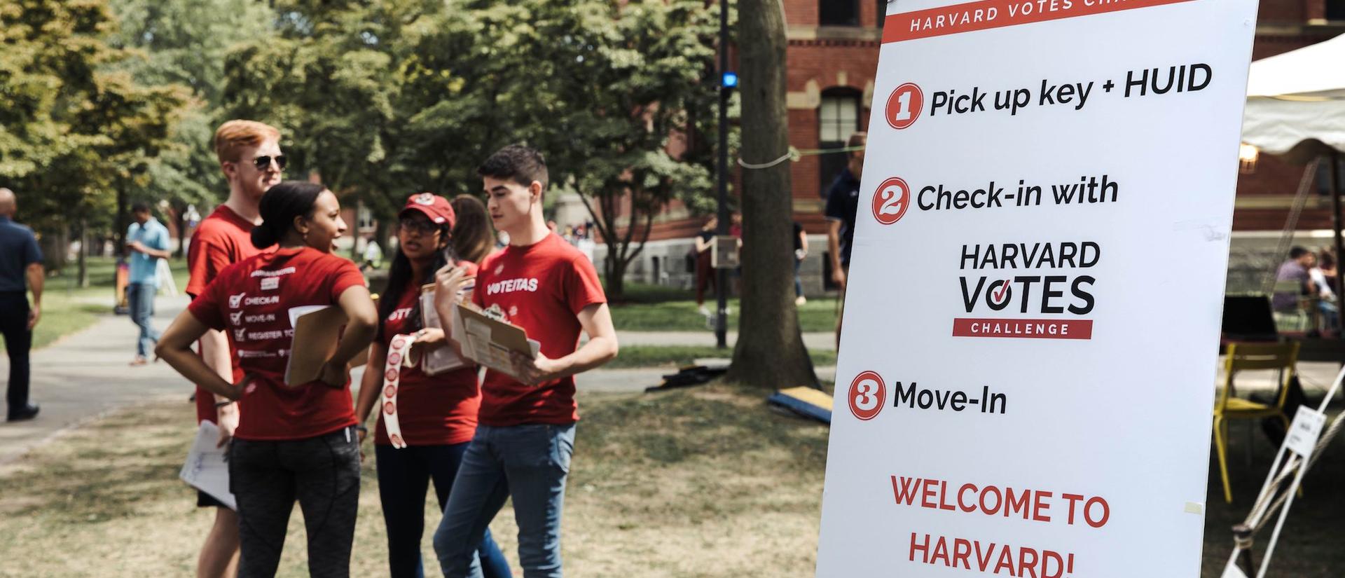 Sign in Harvard Yard directs students to register to vote